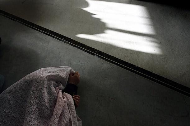 A girl mourns the death of her cousin before a funeral in the West Bank town of Hebron.

