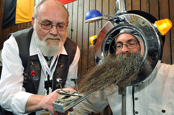 A man's beard is measured during the International German Beard Championships in Schluchsee, Germany.


