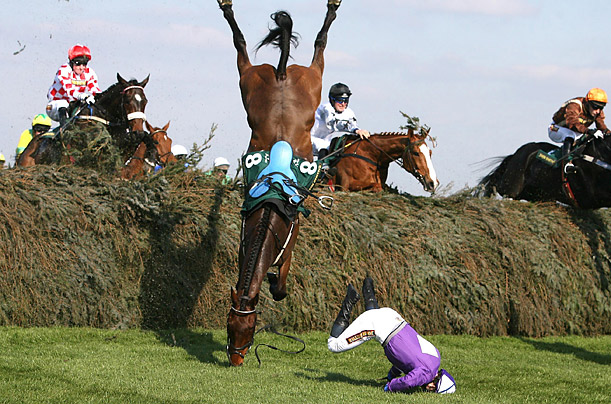 A horse loses his mount during the John Smith's Fox Hunters' Chase on the first day of the Grand National horse race meeting in Liverpool, England.
