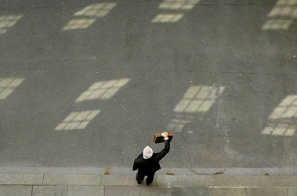 Britain's Chancellor of the Exchequer Alistair Darling poses with his ministerial red dispatch box as he leaves 11 Downing Street, en route to delivering the annual budget to the House of Commons.