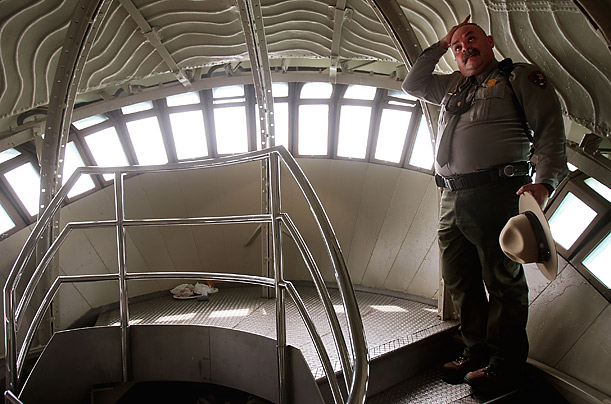 National Park Service Ranger Eugene Kuziw stands in the soon-to-be-reopened crown of the Statue of Liberty.