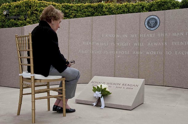 Former U.S. first lady Nancy Reagan places flowers at her husband's resting place at the Ronald Reagan Presidential Library in Simi Valley, California, on the fifth anniversary of his death.