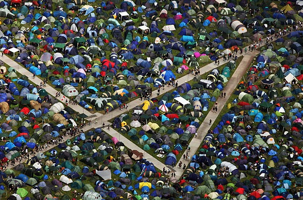 The tents of a few of the 140,000 music fans attending the Glastonbury Festival in Somerset, England dot the festival grounds.