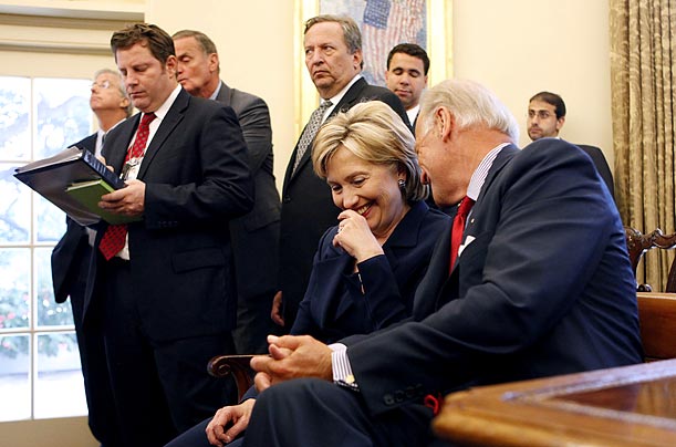 Sharing a Thought Vice President Joe Biden talks with Secretary of State Hillary Rodham Clinton during a meeting between President