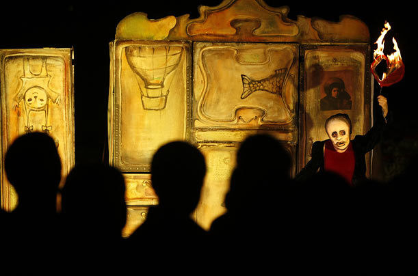 An actress from Mr. Pezo's Wandering Dolls performs in Moscow