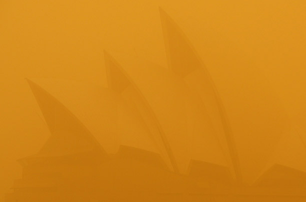 The Sydney Opera House, blanketed by a dust storm