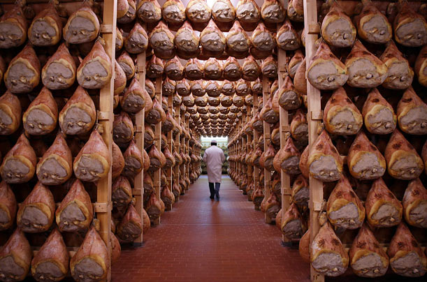 Fancy Meats
A worker checks the room where Parma hams are hung to dry during the process of making prosciutto, in Langhirano, Italy.