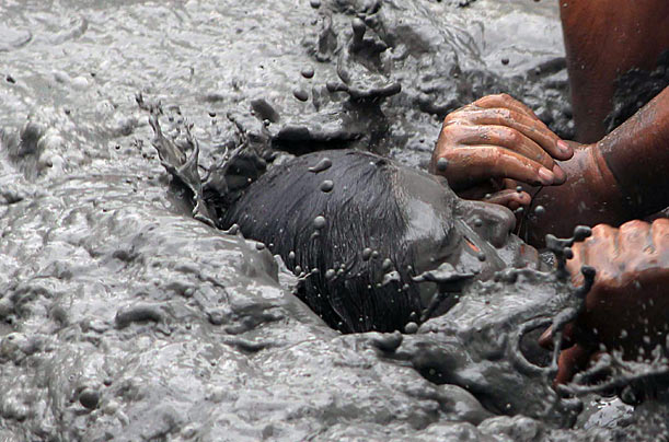 In You Go
A woman is submerged in a pool of water during a prayer and healing ritual at the Espinazo community in Nuevo Leon State, Mexico.