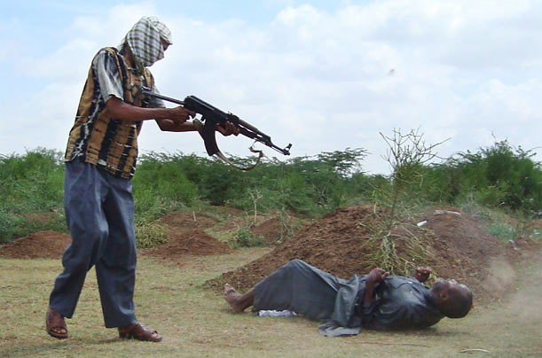 An Eye For An Eye
A murderer is shot by a relative of the victim in the district of Afgoye, Somalia.