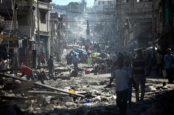 Hell
People walk through the destroyed streets of the Haitian capital.