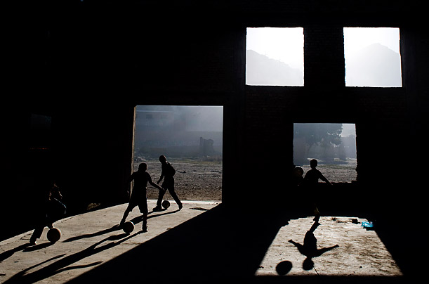 The Space Between

Afghan children play soccer in a dilapidated house in Kabul, Afghanistan.
