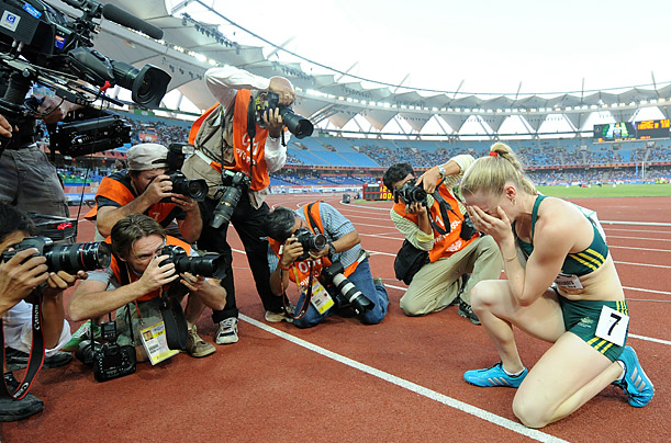 Australia's Sally Pearson celebrates her win in the 100m hurdles women final of the Track and Field competition of the XIX Commonwealth Games in New Delhi. 

